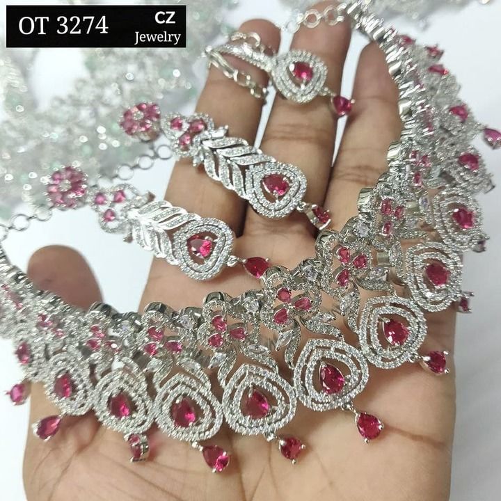 Highly demanded High quality cz white rhodium and rose gold plated designed choker with earrings. uploaded by business on 5/2/2021