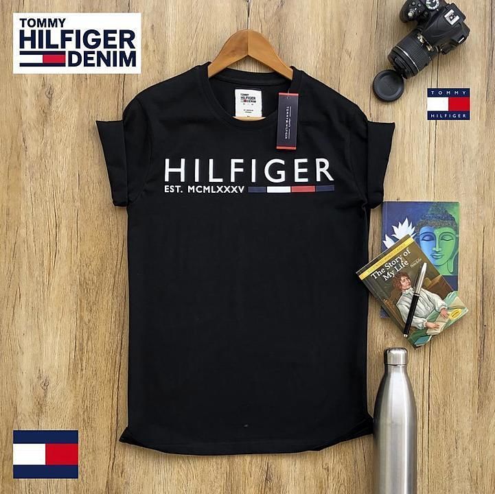Post image *💥Till 2XL size available *

Brand - **TOMMY HILFIGER**

Style - **Men's Round Neck T-Shirt With High Quality pigment and  non pvc print**

Fabric - **100% Cotton Single Jersey **

Size -  *M,L,XL,XXL*

Ratio -  **2 2 2 1**

Price - *rs 470 free shipping *
            

**All goods are in Single pcs packed.**

** All goods are master packed **