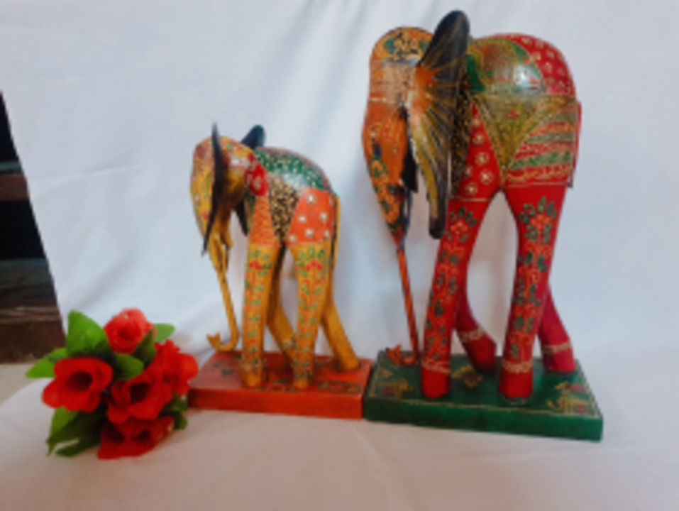 Handcrafted and handpainted wooden iron elephant figurine. uploaded by business on 5/8/2021