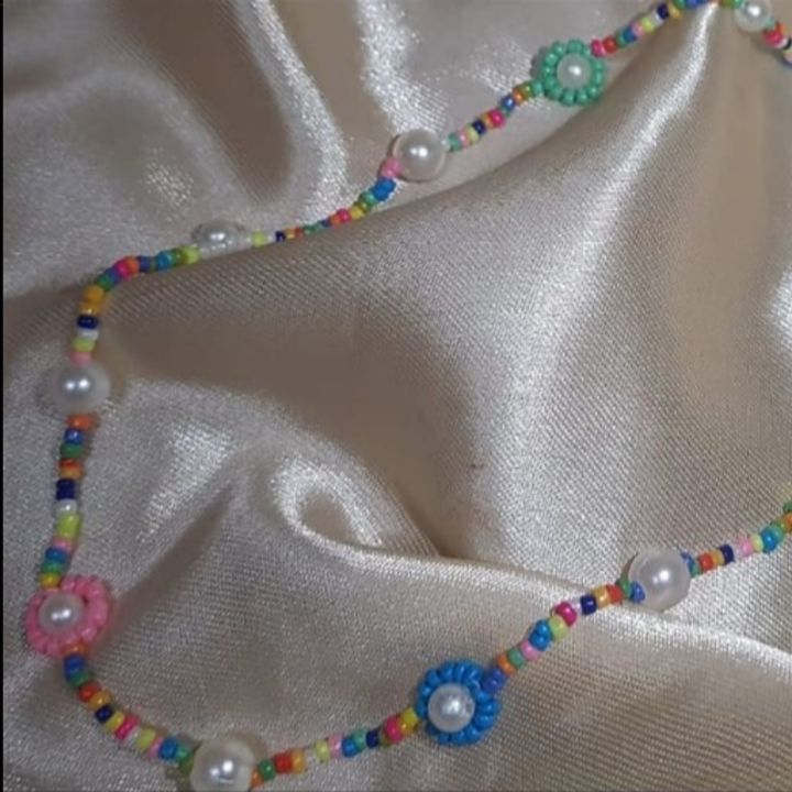 Colorful daisy and pearl necklace  uploaded by The Saturn Shop on 5/9/2021