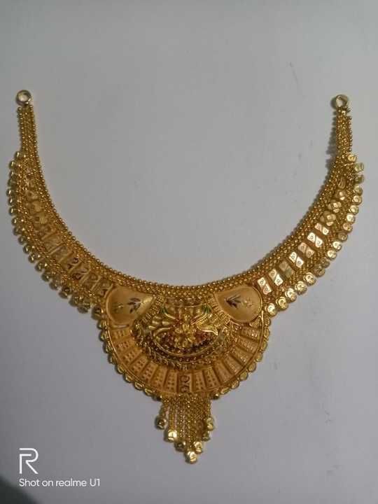 Gold necklace uploaded by business on 5/11/2021