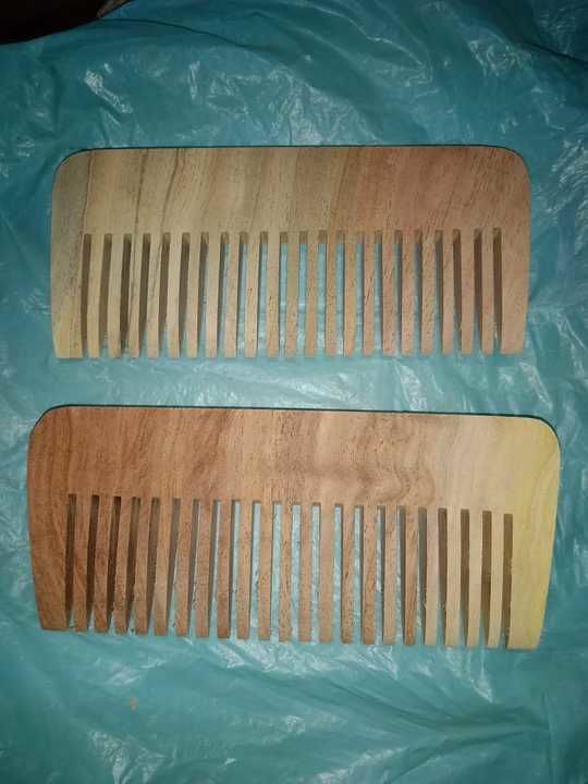Pocket neem wood comb uploaded by business on 5/14/2021