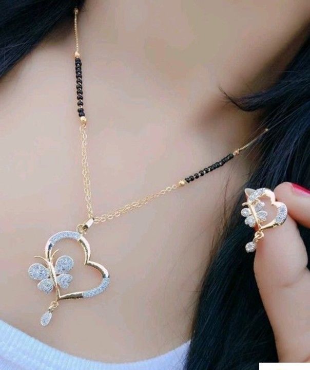 Post image Feminine Chunky Mangalsutras

Base Metal: Alloy
Plating: Gold Plated
Stone Type: Cubic Zirconia/American Diamond
Sizes:Free Size
Dispatch: 2-3 Days
Cash on delivery available, 
Easy return available 
Free shipping 
Book fast now
