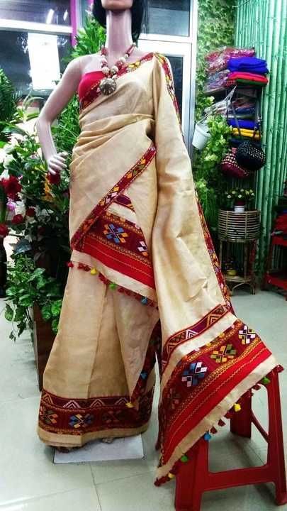 Post image Completely hand made chadar mekhela set. The set is made on hand loom by rural weaver. The material is pure muga silk . Muga silk is made from Silkworm which produce organically. It's very costly and it's color is light yellow. Thus products us only available in Assam . It's  very comfortable to wear.