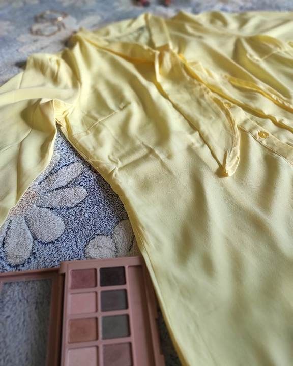 Pastel yellow shirt uploaded by business on 5/20/2021