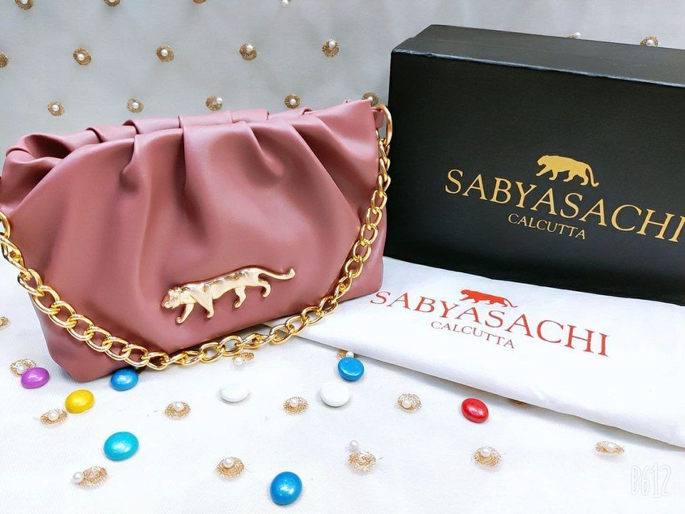 Post image WhatsApp at 8630253385 

*SABYASACHI BAG*

👉GOOD QUALITY 
👉With Brand Dust Cover 
👉With Box

👉*PRICE : Rs. 1450*

👉 NOTE : SINGLE PIECE AVAILABLE

*FREE SHIPPING 🚢 IN INDIA*