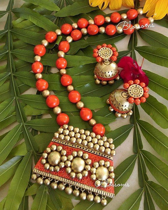 Orange and gold terracotta set. Color can be customized uploaded by business on 8/7/2020