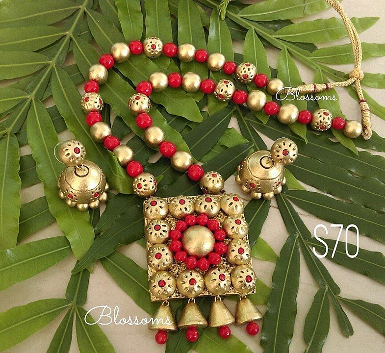 Red and gold terracotta jewelry. Color can be customized uploaded by business on 8/7/2020