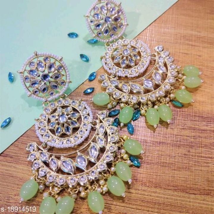 Glittering earrings uploaded by business on 5/28/2021