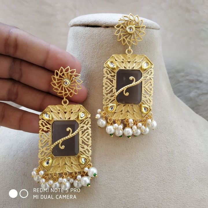Exclusive stone earrings uploaded by business on 5/29/2021