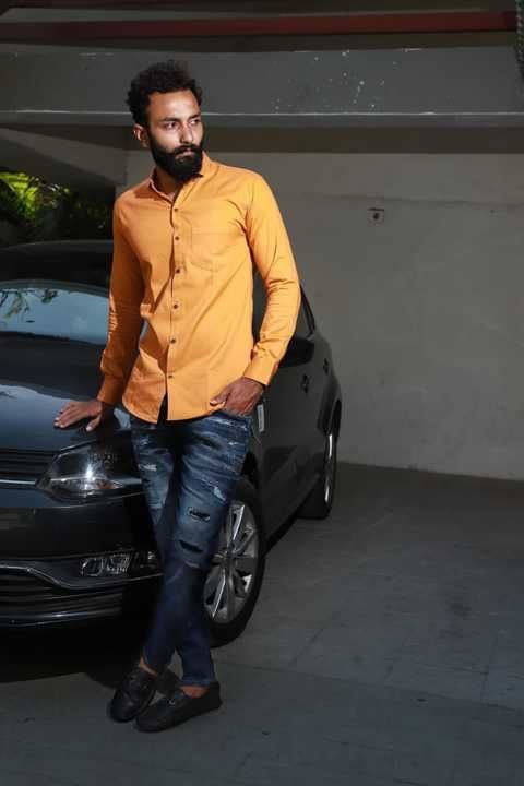 Plan orange shirt for men uploaded by Piyush Chohan on 5/30/2021