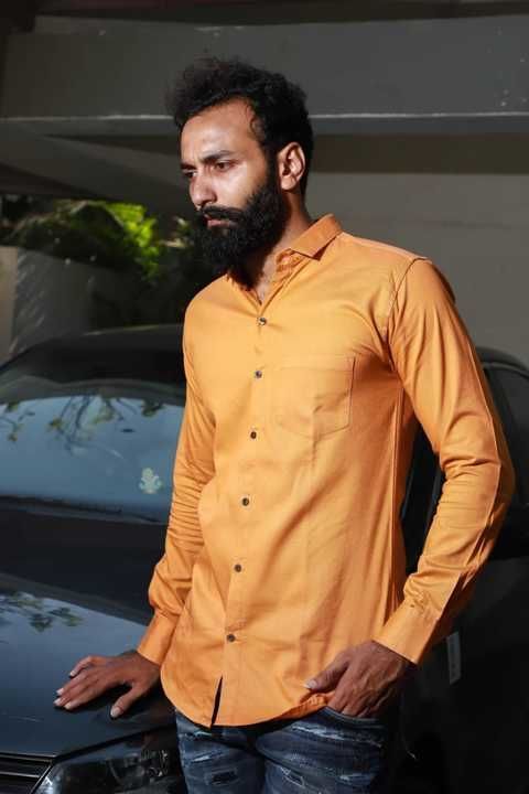 Plan orange shirt for men uploaded by Piyush Chohan on 5/30/2021