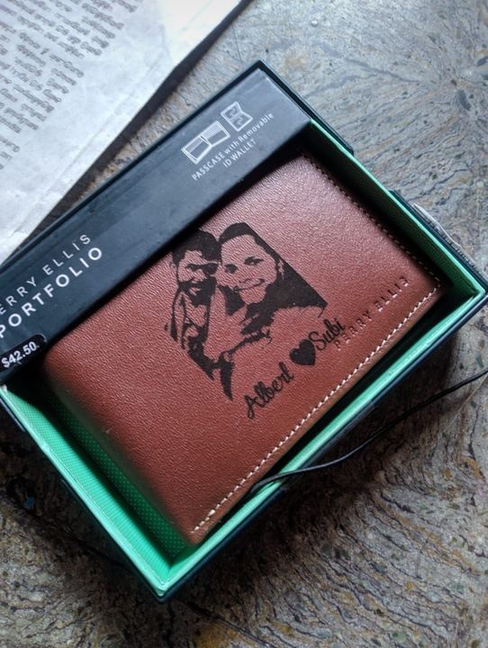 Perry Ellis Branded wallet uploaded by SanthiGifts and pencil carvings on 6/5/2021
