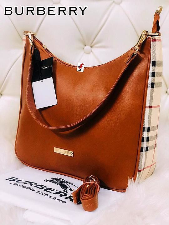 Post image *Burberry U Cut Hobo*
 Price- *1250+$•*
Quality- 7 A Quality with Dust Bag 
Size - 13/10 inches