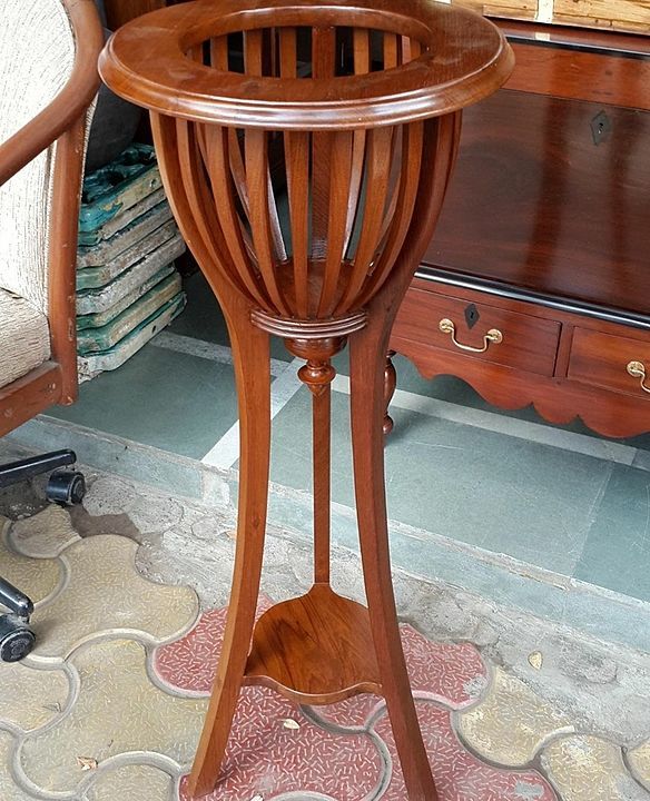 Wooden planter stand uploaded by business on 8/11/2020