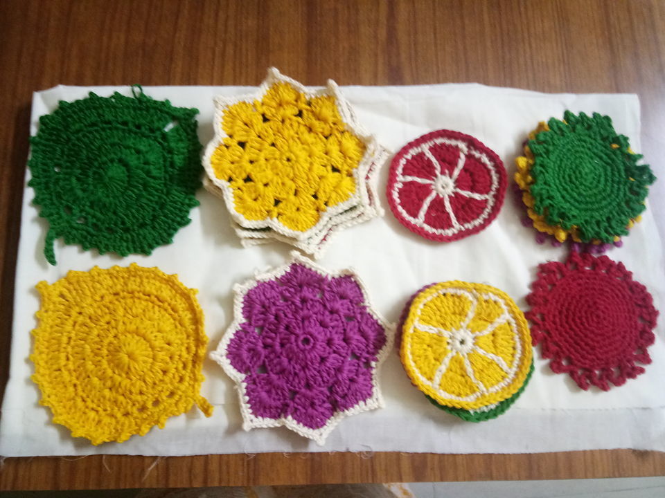 Post image Crocheted coasters in Anchor cotton yarnfor multi purpose use...Decorate and enhance your teapoy,coffee table and/dining table with these colurful decor....sets of 4..