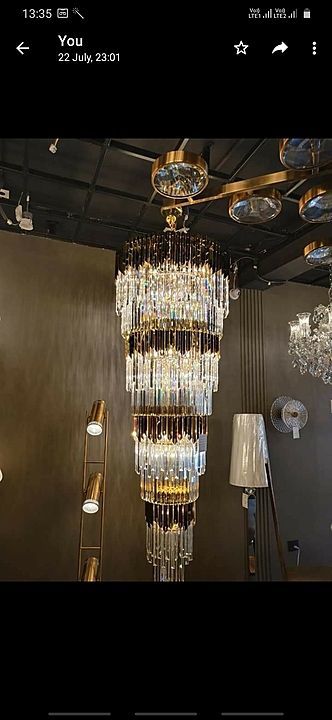 Modern hanging crystal gold chandilier  uploaded by R.n Enterprises  on 8/12/2020