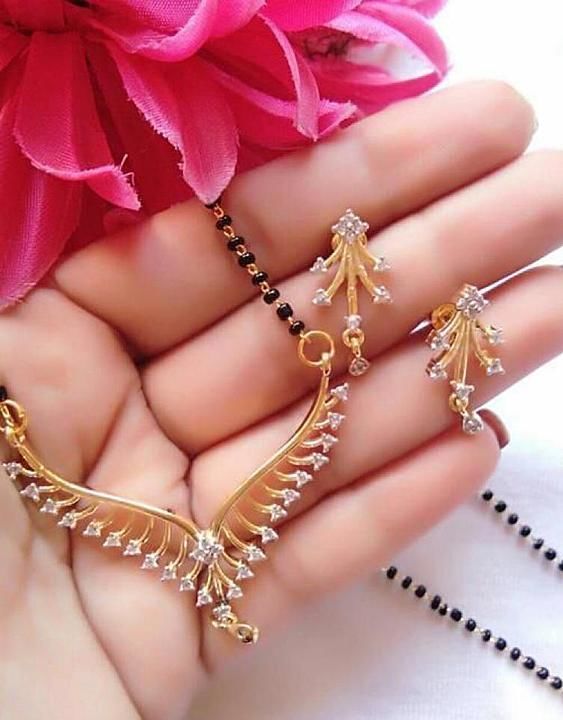 Beautiful Mangalsutra with chain and ear rings uploaded by business on 8/13/2020