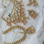 Business logo of Nizam Pearls Jewelry
