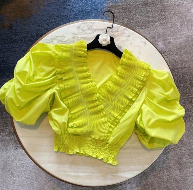Frill top uploaded by business on 6/17/2021