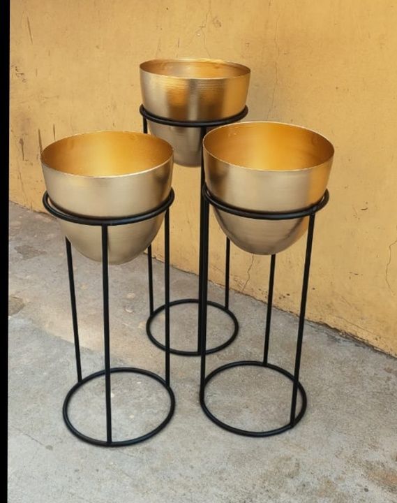 Copper look three pcs stand planter uploaded by business on 6/18/2021