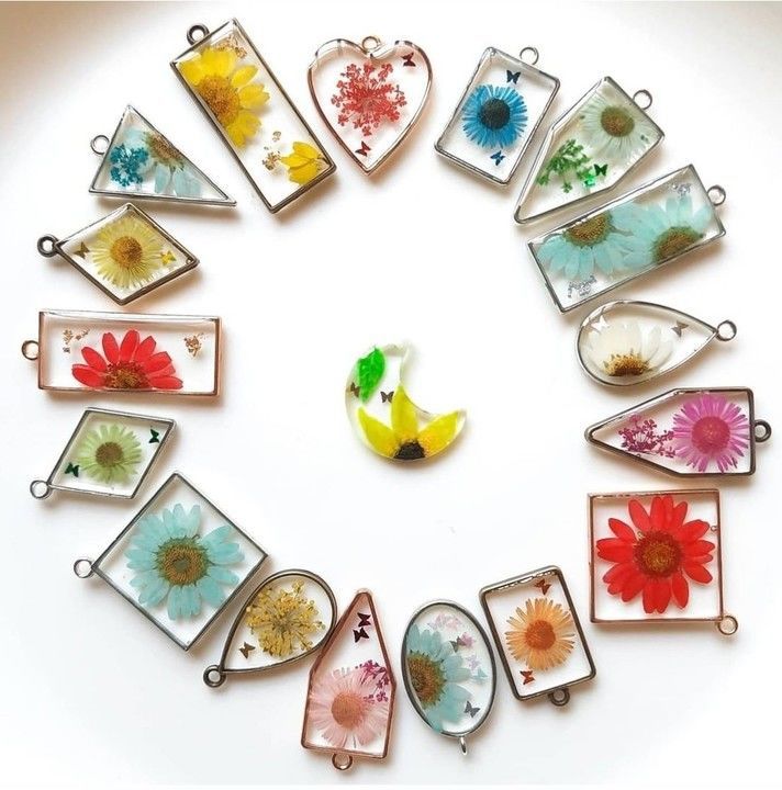 Resin floral pendants uploaded by Resinartssy on 6/21/2021