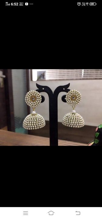 Silk thread moti earrings uploaded by business on 6/23/2021