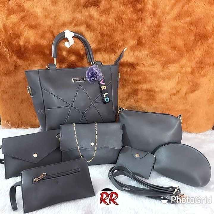 JIMMY CHOO 7PC COMBO 

THE BEST QUALITY

1) MAIN BAG WITH BACK CHAIN
2) SLING BAG
3) MONEY CARRYING  uploaded by business on 8/16/2020