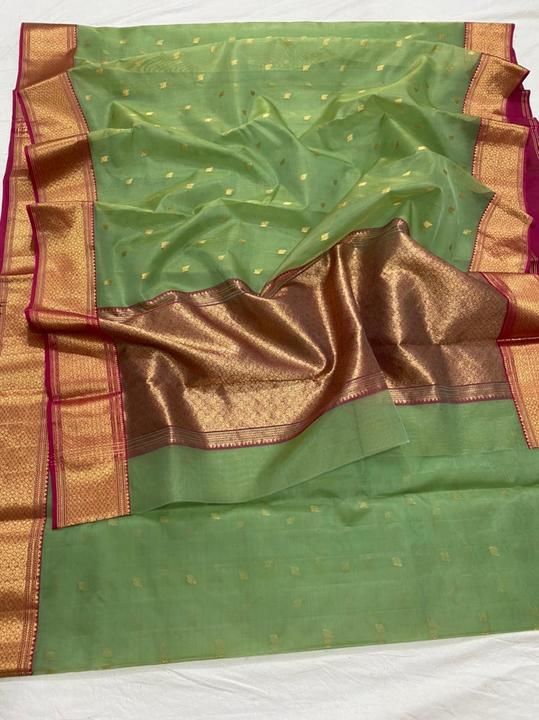Post image chanderiloom Handloom chanderi pure katan organza silk ( silk by silk) saree with blouse . 
To purchase DM or WhatsApp +91 7509234881 Total saree length - 6.50 meter / 5.70 meter... Saree , blouse 80 cm 
( Running blouse ) Please note there may be a slight difference in colour due to the camera resolutions . ..This product is handmade and may have slight irregularities which is a natural outcome of human involvement in the process . ..