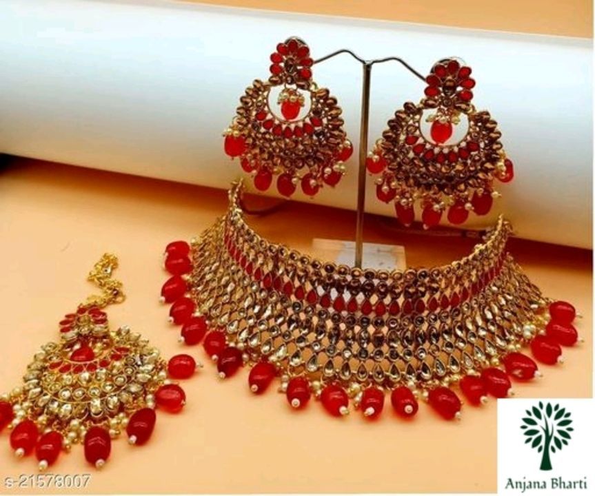Post image Catalog Name:*Feminine Chunky Jewellery Sets*Base Metal: AlloyPlating: Gold PlatedStone Type: Pearls,KundanType: Necklace Earrings MaangtikaMultipack: 1Easy Returns Available In Case Of Any Issue