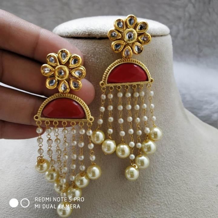 Post image stylish kundan designs latkan earrings 
brass metal 
push patch closure 
price 330/- free shipping and cod AVAILABLE
