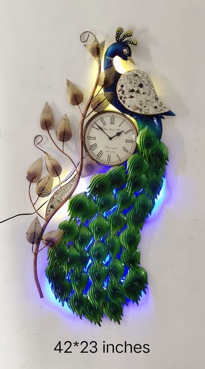 Metal wall peacock with clock uploaded by Himanshi Art on 6/27/2021