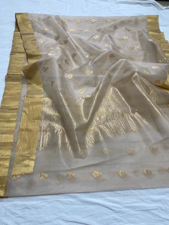 Post image chanderiloom Handloom chanderi pure katan organza silk ( silk by silk) saree with blouse . 
To purchase DM or WhatsApp +91 7509234881 Total saree length - 6.50 meter / 5.70 meter... Saree , blouse 80 cm 
( Running blouse ) Please note there may be a slight difference in colour due to the camera resolutions . ..This product is handmade and may have slight irregularities which is a natural outcome of human involvement in the process . ..Mode of payment NEFT / Phonepe / Googlepay / Paypal . 