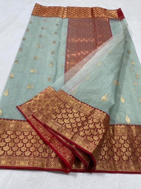 Post image chanderiloom Handloom chanderi pure katan organza silk ( silk by silk) saree with blouse . 
To purchase DM or WhatsApp +91 7509234881 Total saree length - 6.50 meter / 5.70 meter... Saree , blouse 80 cm 
( Running blouse ) Please note there may be a slight difference in colour due to the camera resolutions . ..This product is handmade and may have slight irregularities which is a natural outcome of human involvement in the process . ..Mode of payment NEFT / Phonepe / Googlepay / Paypal . ...We ship sarees worldwide . 