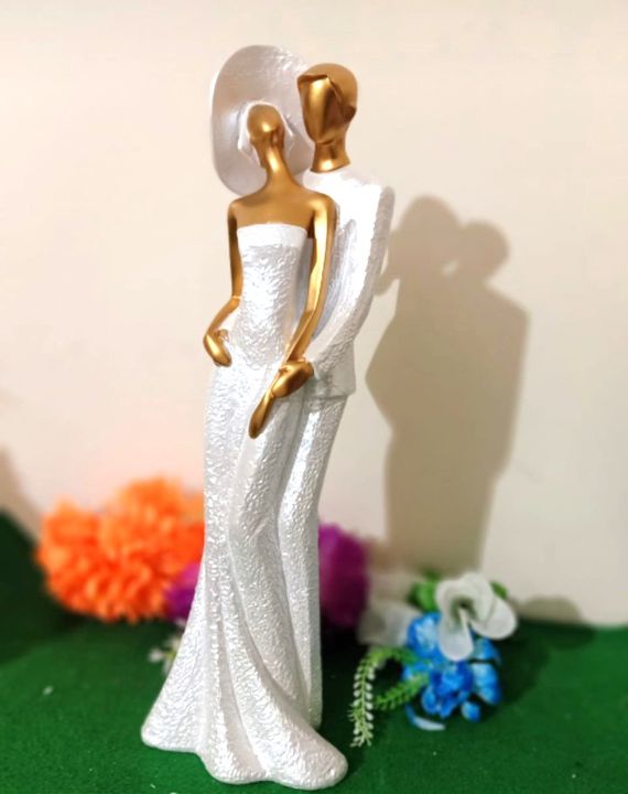Deesha Planters and Decors beautiful white loving wedding couple statue (19x15x57 cms) uploaded by business on 7/11/2021