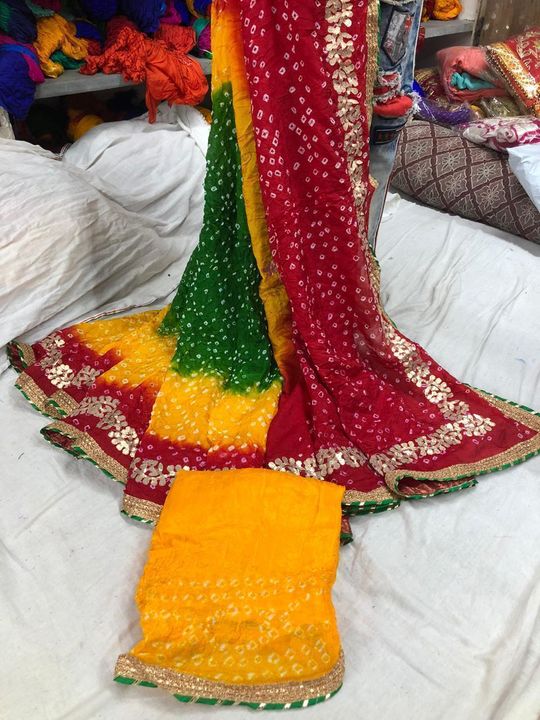Silk Bandhej  saree😍😍 
Fabric art silk 
Work aari gota work
Blouse runng 80 cm

 uploaded by business on 7/13/2021