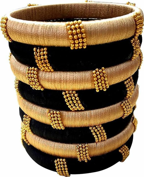 Black and gold bangles  uploaded by business on 7/15/2021