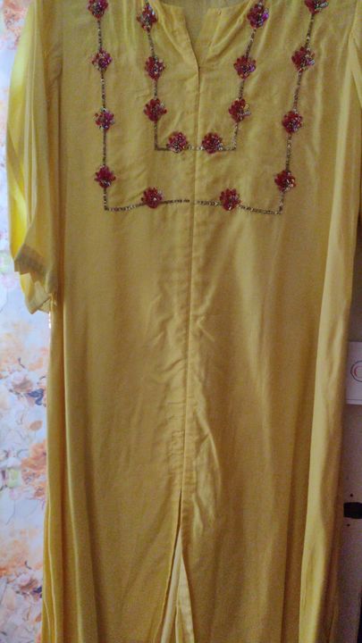 Yellow dress uploaded by Tamanna Goenka on 7/16/2021