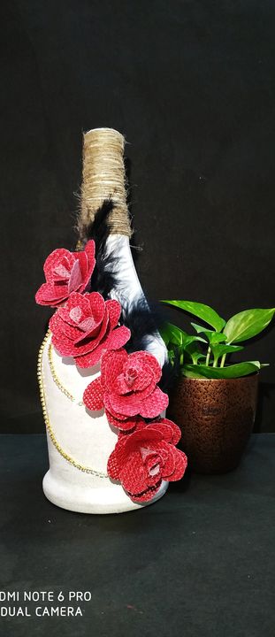 Red parrot jute flower.  uploaded by J&D handcrafts on 7/22/2021