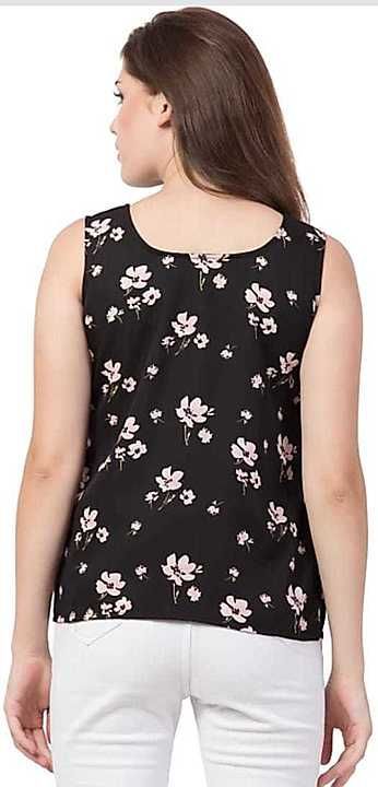 Black flower printed women top uploaded by business on 8/24/2020