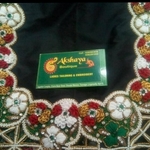 Business logo of Akshaya calaction in boutique