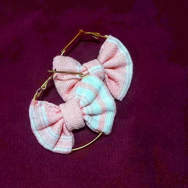 Pink bow earrings uploaded by business on 7/30/2021