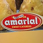 Business logo of Amarlal Sweet Caters