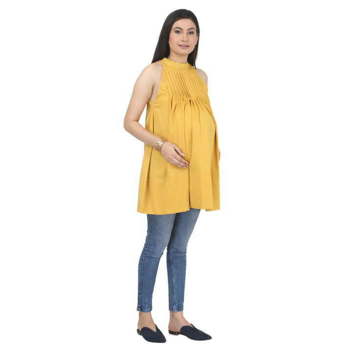 Yellow Tunic with halter neckline and releasef tucks. uploaded by business on 8/5/2021