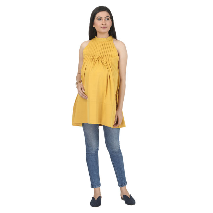 Yellow Tunic with halter neckline and releasef tucks. uploaded by Dress My Babybump on 8/5/2021