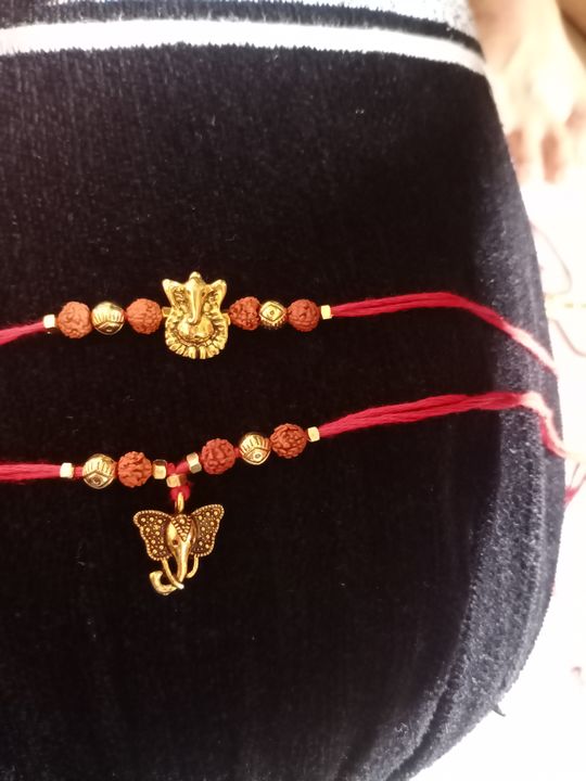 Product image with price: Rs. 50, ID: couple-rakhi-ca517c8f