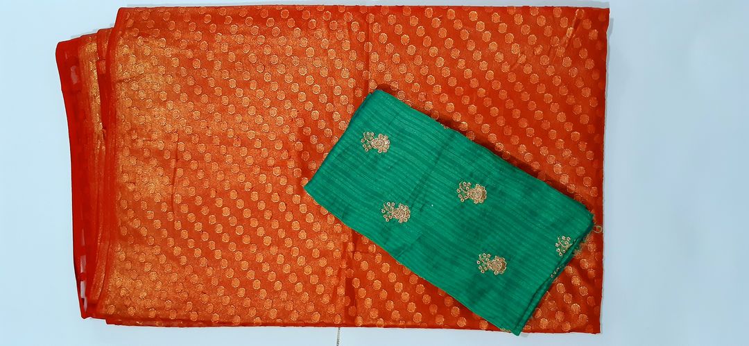 Post image Srishti's Collection. Synthetic Saree with Embroidery Blouse. Saree Colour- Rust and Blouse Colour- Green with Thread Embroidery. Saree is 5.5m and Blouse is 1.5m in size. It is an unstitched saree and blouse piece available at a price of ₹650