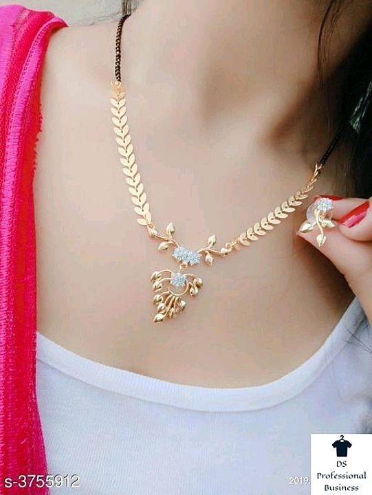 Post image Catalog Name:*New Elegant Mangalsutra*
Base Metal: Alloy
Stone Type: Artificial Stones
Plating: Gold Plated
Multipack: 1
Type: Big pendant mangalsutra &amp; Earrings
Sizing: Non-Adjustable
Sizes: 18 in
*it's price only for ₹350*