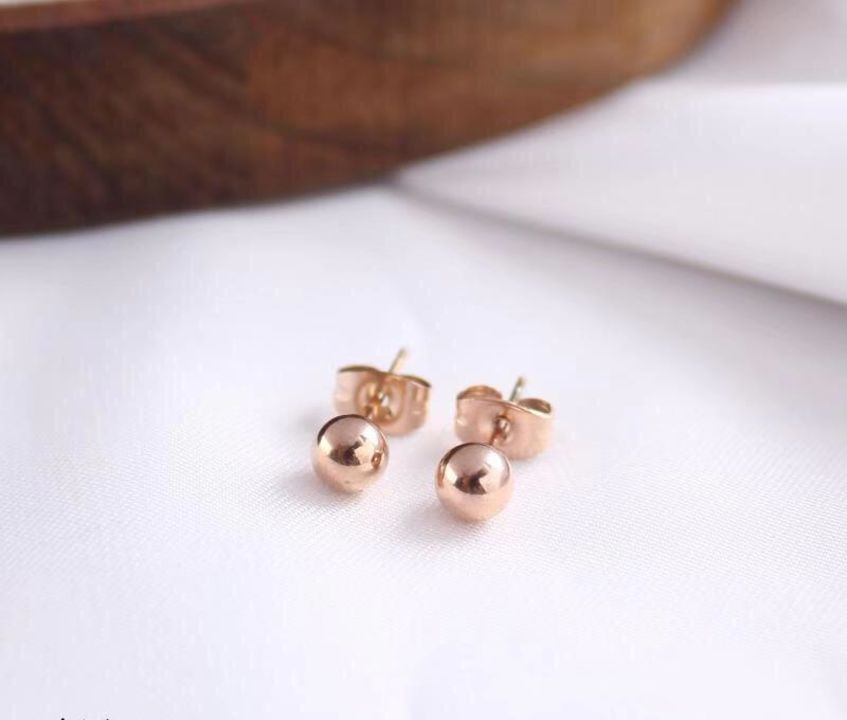 Rose gold earrings uploaded by business on 8/12/2021