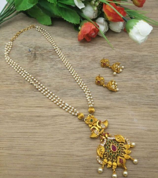 *Glistening Pearls & Stones Matt Finish Gold Plated Temple Jewellery Sets*

*Details:*
Description:  uploaded by SN creations on 9/1/2021